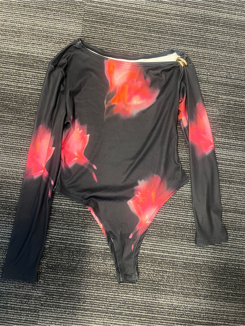Black One-Piece Bodysuit with Reddish Pink Floral and Gold Shoulder Accent